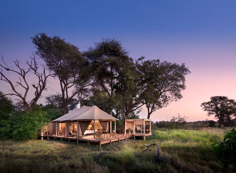 Botswana-Nxabega-Okavango-Tented-Camp-Tent-exterior-at-sunset.jpg